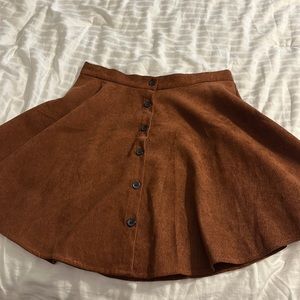 EUC SHEIN corduroy brown button up skirt has flare at bottom